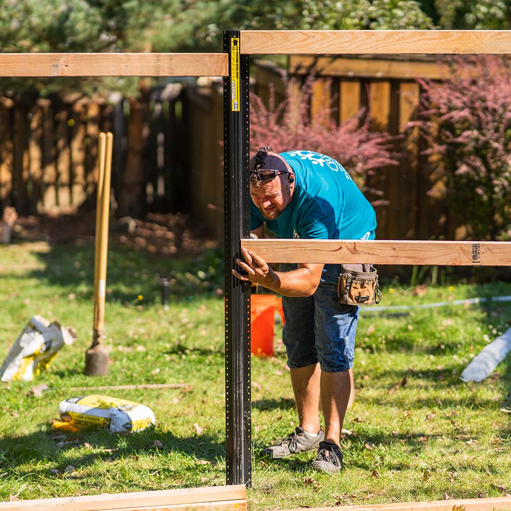Lifetime Steel Post® installation with fence rails
